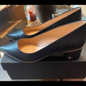 Coach black pumps size 9.5